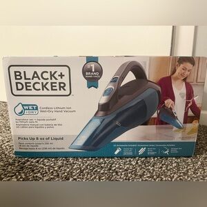 Black and Decker wet dry cordless hand vacuum. Never used still sealed in box
